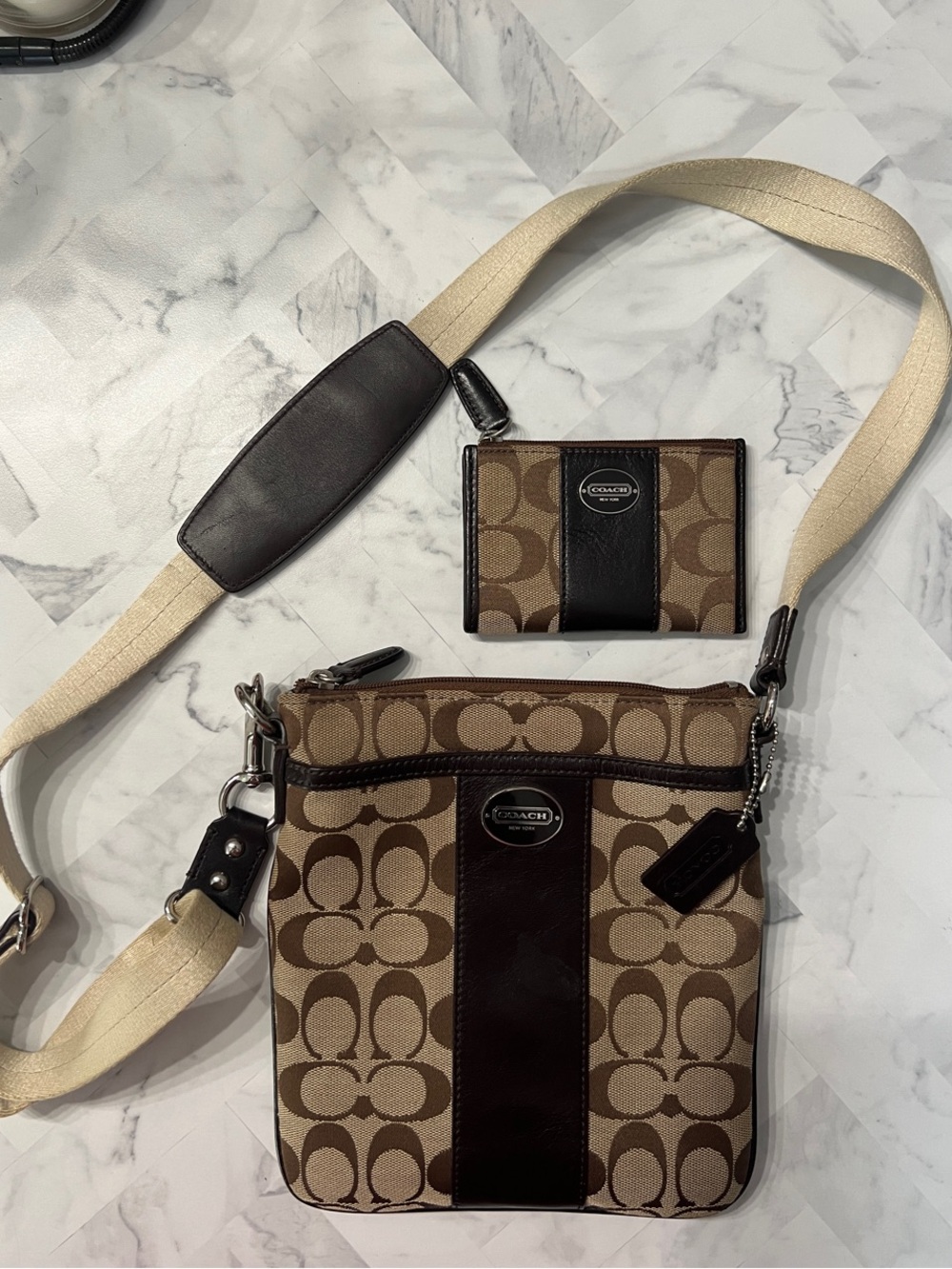 Coach Brown Signature Canvas Messenger Bag with Cream Strap